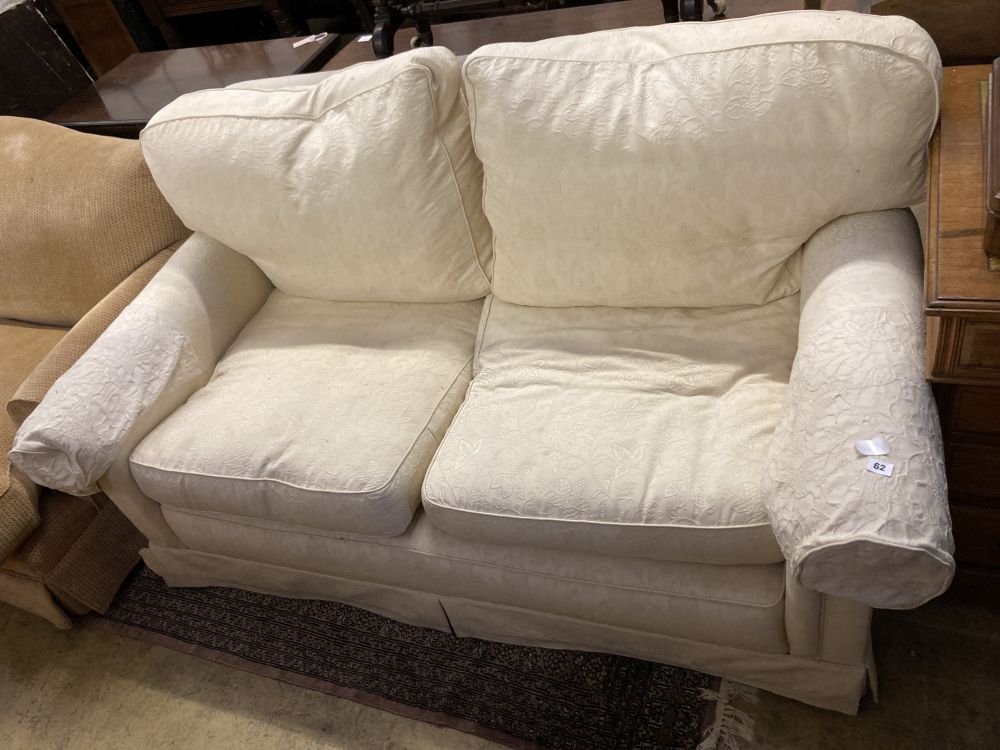 A contemporary cream brocade upholstered two seater settee, width 170cm depth 92cm height 86cm